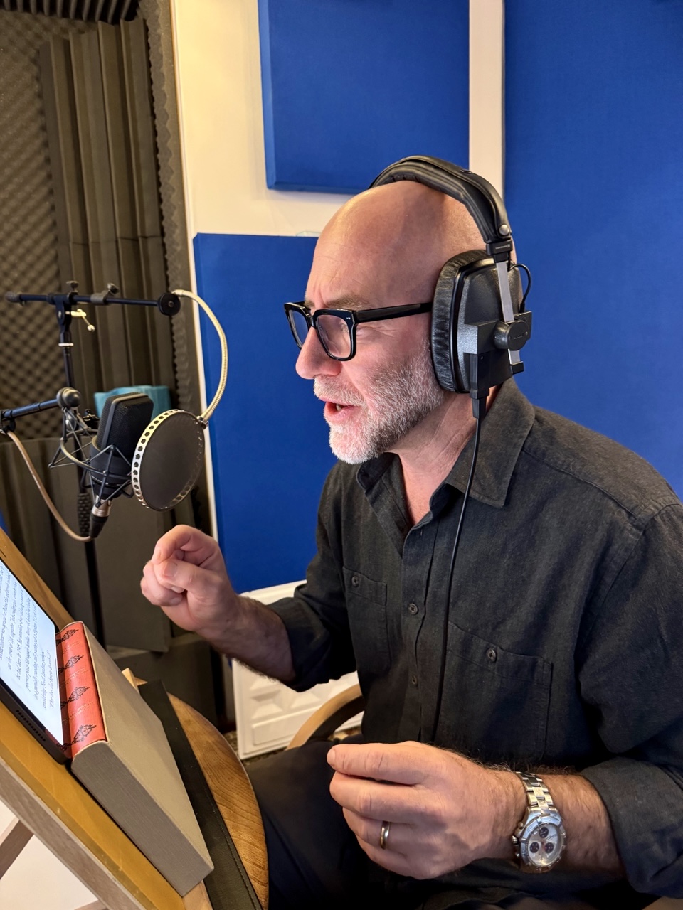 Daniel Grace narrating the In the Wake of Golgotha audiobook in studio